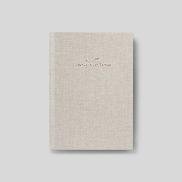 Stoffeinband veredelt